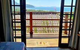 Burung Flats Itamambuca - Hospedagem com vista para o mar